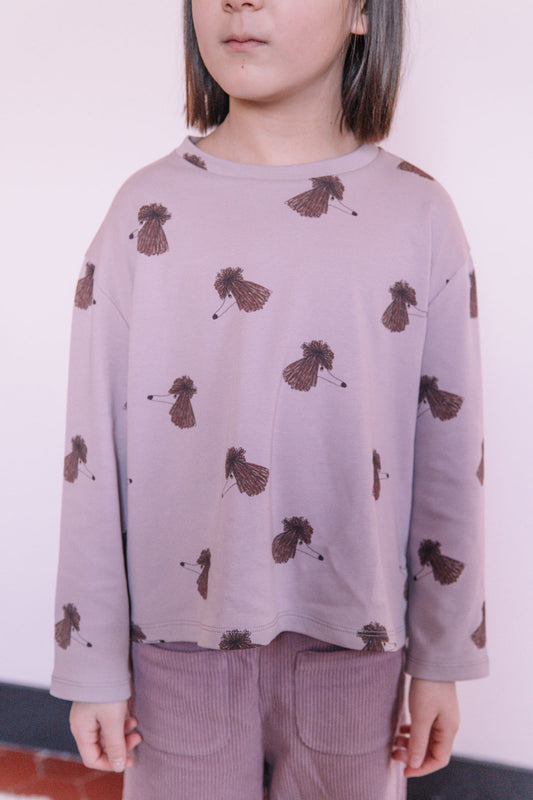 Kind draagt Studio Bohème Essentiel Chien Soeur longsleeve